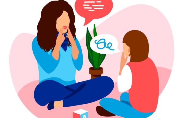 Thérapeute qui travaille la communication avec un enfant