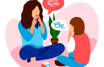Thérapeute qui travaille la communication avec un enfant
